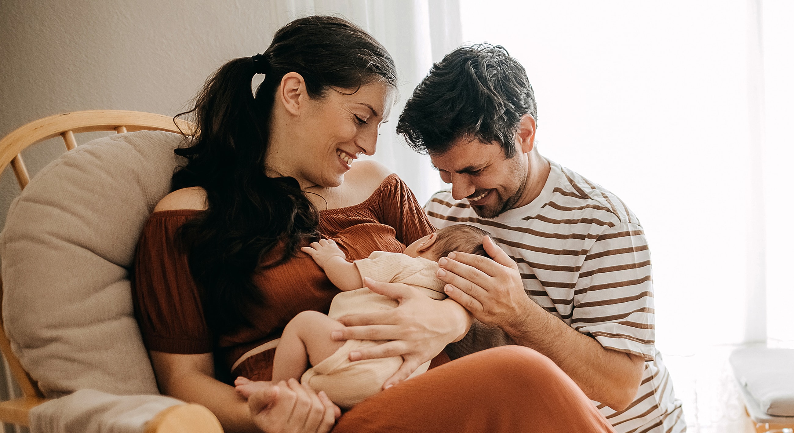 Family bonding moment with a newborn baby.