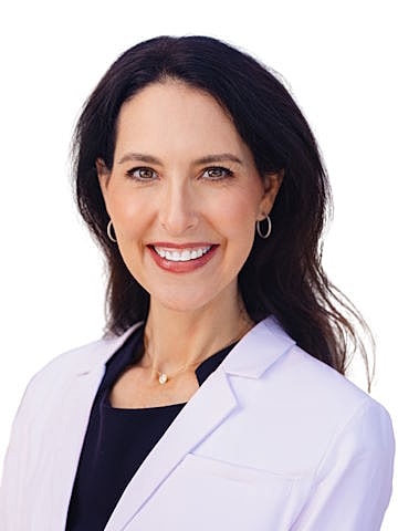 Smiling woman in professional medical attire