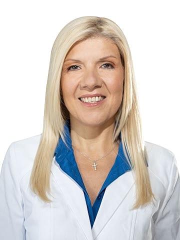 Professional woman in a white lab coat.