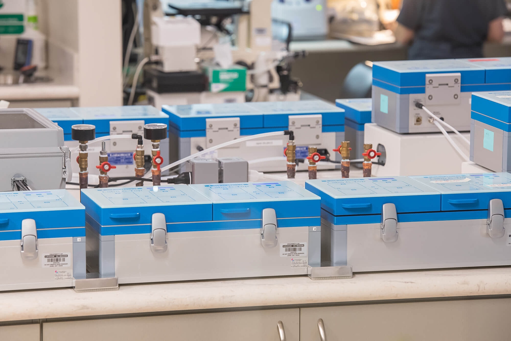 Laboratory equipment with blue and gray components.