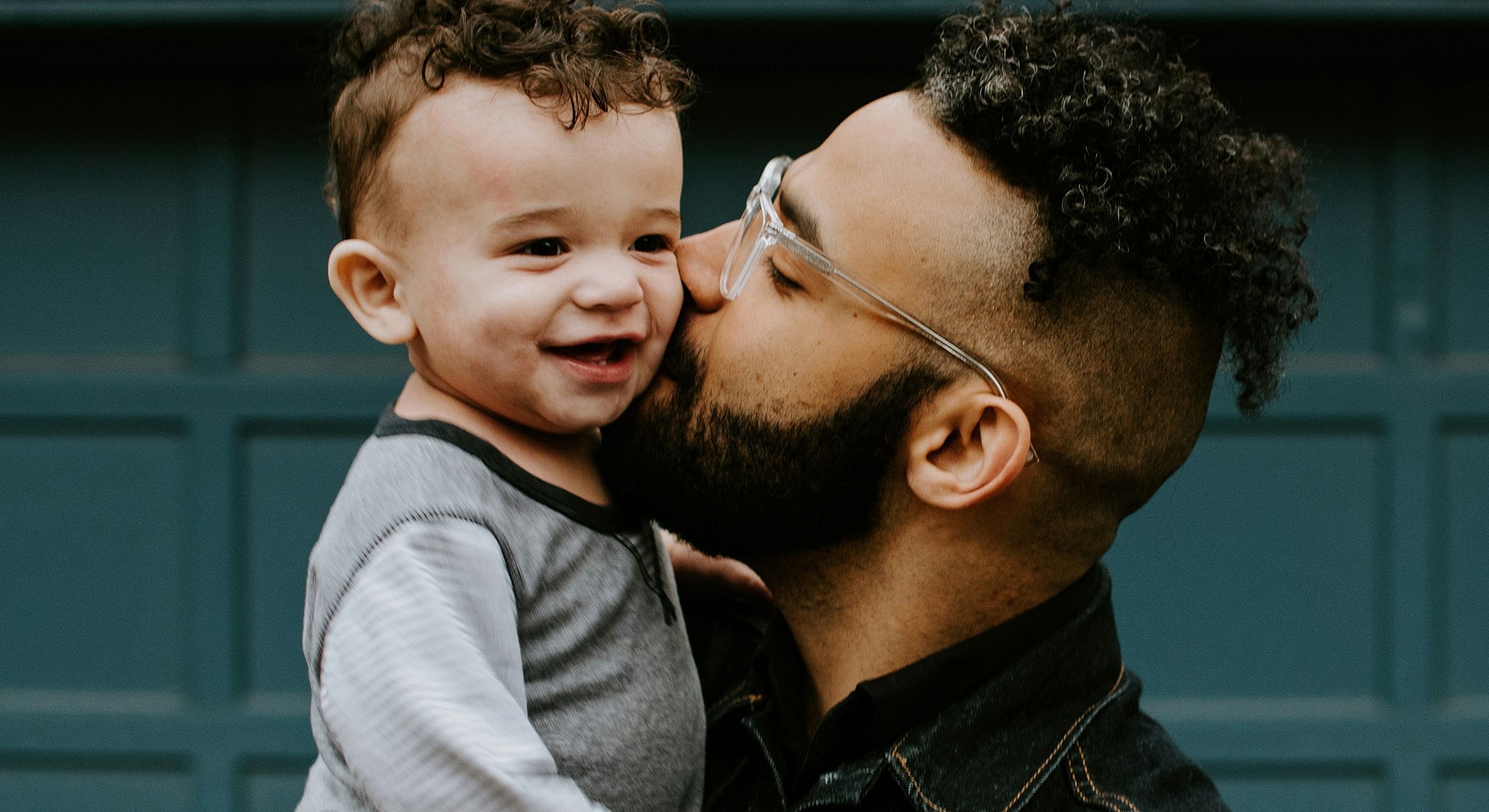 Father and child sharing a joyful moment.